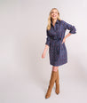 Model is wearing UNTUCKit Cotton Stretch Foulard Print Sydney Shirtdress. 