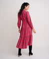 Model is wearing UNTUCKIt Meredith dress in plaid red.