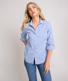 Model is wearing UNTUCKit  Wrinkle-Free Stretch Cotton Bella Shirt in blue and white stripe.