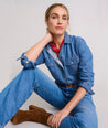 Model is wearing UNTUCKit Cotton Classic Serena Denim Shirt.