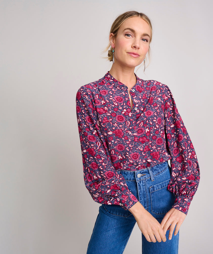 Model is wearing UNTUCKit Soft Fall Floral Gemma Shirt.