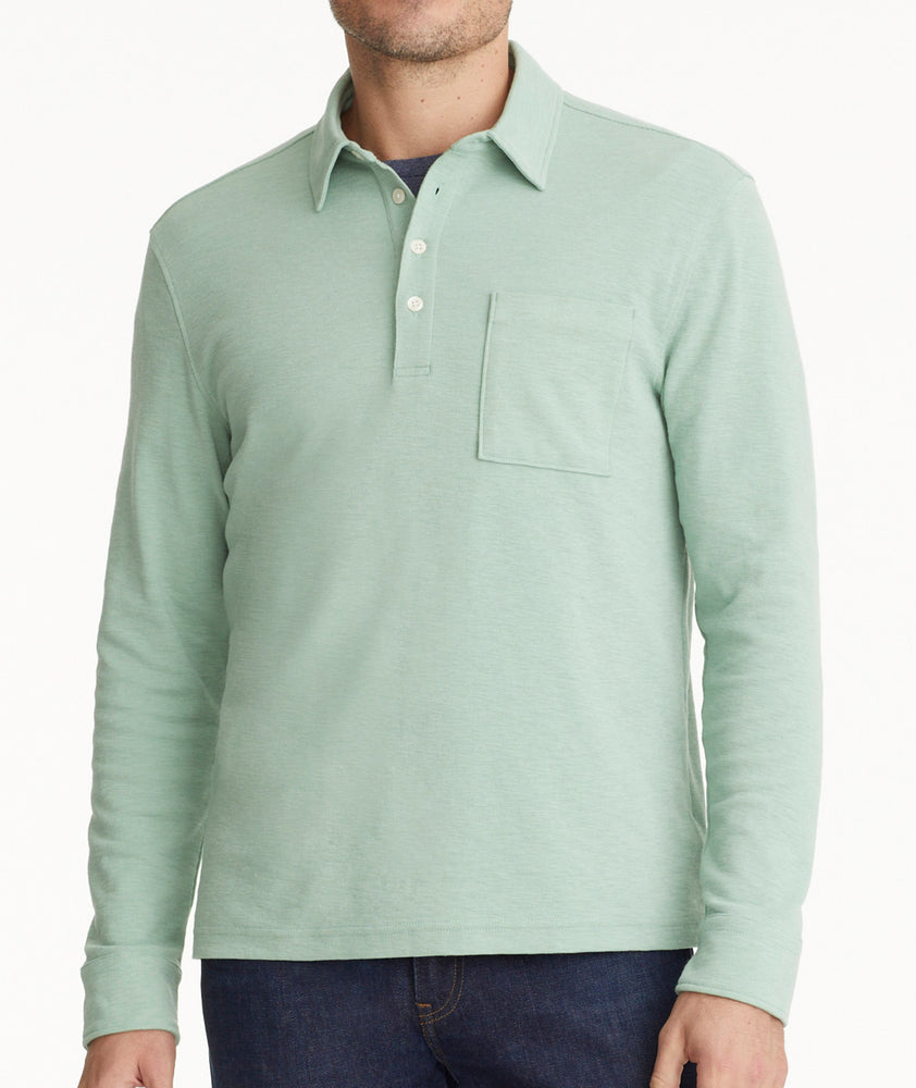 Model is wearing UNTUCKit Agrill Heavyweight Polo in Granite Green.