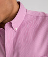 Model wearing an UNTUCKit Mid Red Wrinkle-Free Cadetto Shirt