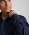 Model wearing a Mid Blue Wrinkle-Free Denim Cinzano Shirt