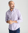 Model is wearing UNTUCKit dolcetto wrinkle free button down.