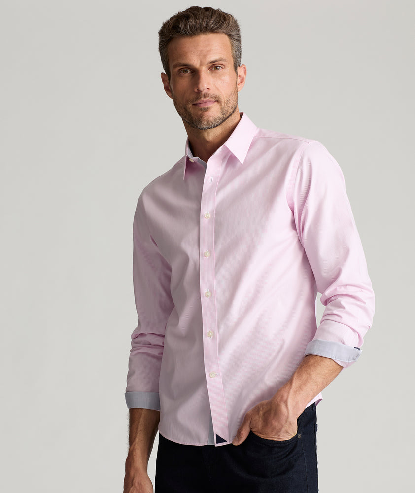 Model is wearing UNTUCKit Douro wrinkle-free shirt. 