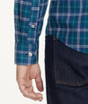 Model is wearing UNTUCKit Wrinkle-Free Harwin Shirt Teal Multi Plaid.