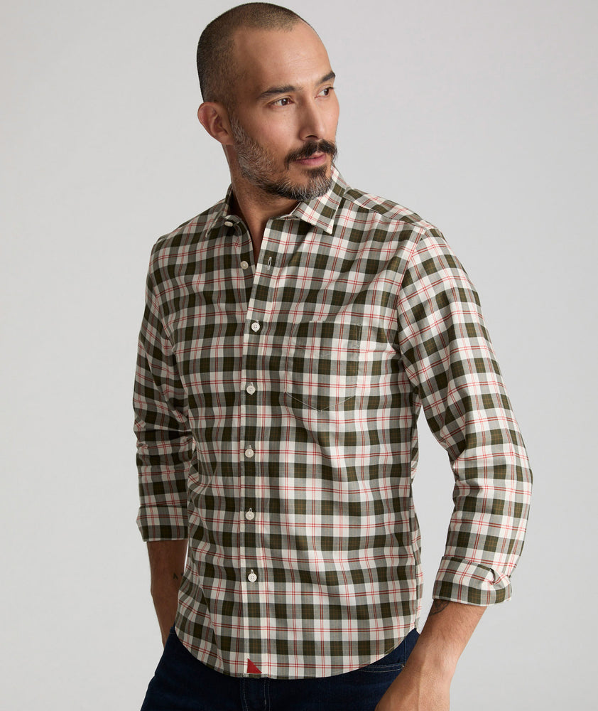 Model is wearing UNTUCKit Harwin wrinkle-free shirt. 