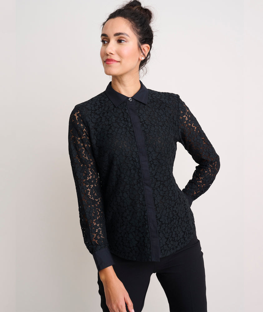 Model is wearing UNTUCKit Holly shirt in black.