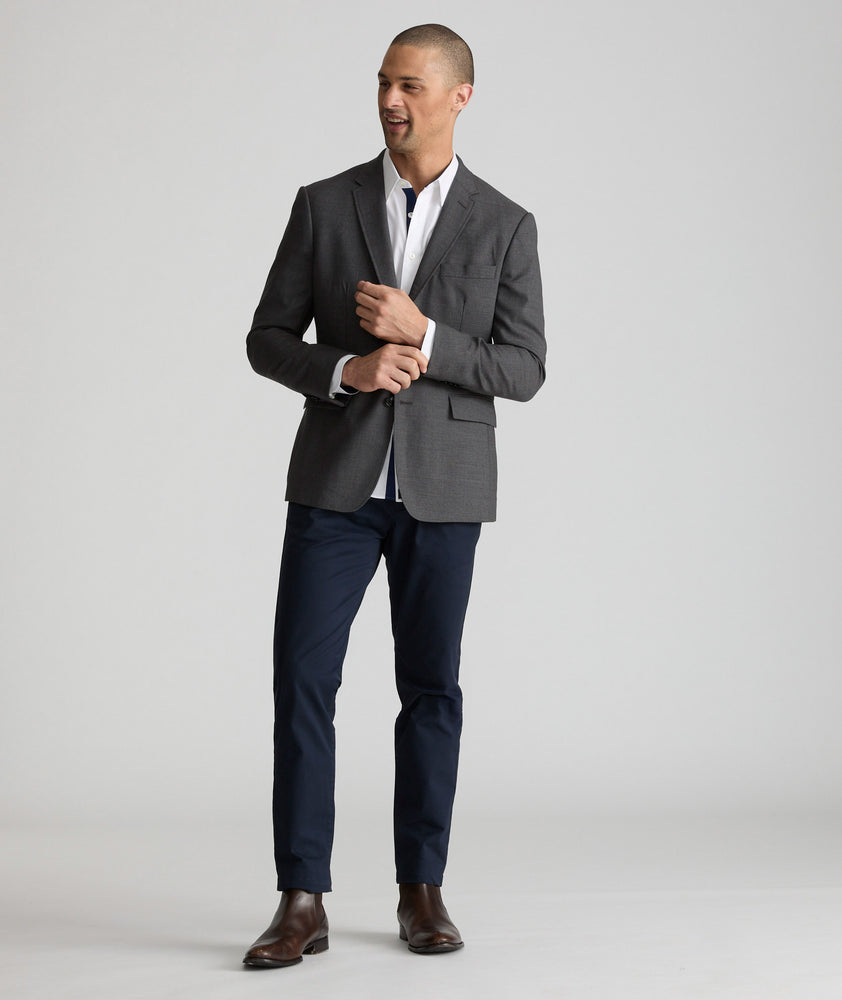 Model wearing an UNTUCKit Grey Wrinkle-Resistant Palazzo Sport Coat.