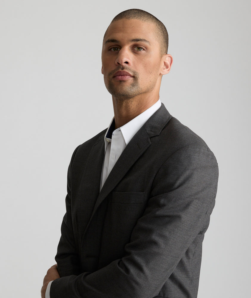 Model wearing an UNTUCKit Grey Wrinkle-Resistant Palazzo Sport Coat.