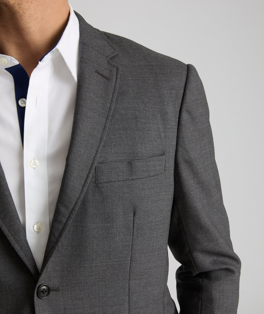 Model wearing an UNTUCKit Grey Wrinkle-Resistant Palazzo Sport Coat.