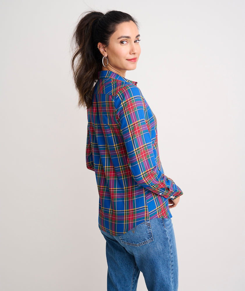 Model is wearing UNTUCKit Sadie shirt in blue plaid.