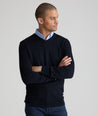 Model is wearing UNTUCKit sweater in navy.