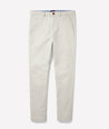 Model is wearing UNTUCKit Classic Chino Pants in Stone Gray.