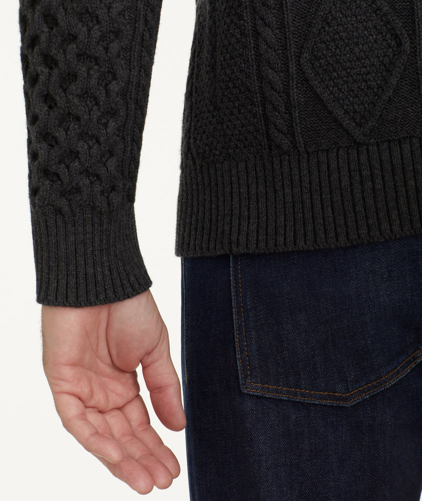 Model is wearing UNTUCKit Cable Knit Crewneck Sweater.