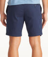 Model wearing UNTUCKit Navy Drawstring Shorts